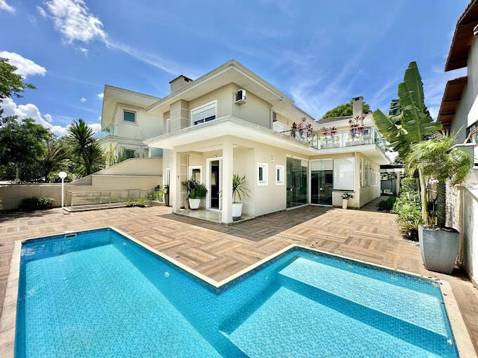 Casa de Condomínio à venda e aluguel com 4 quartos, 358m² - Foto 1